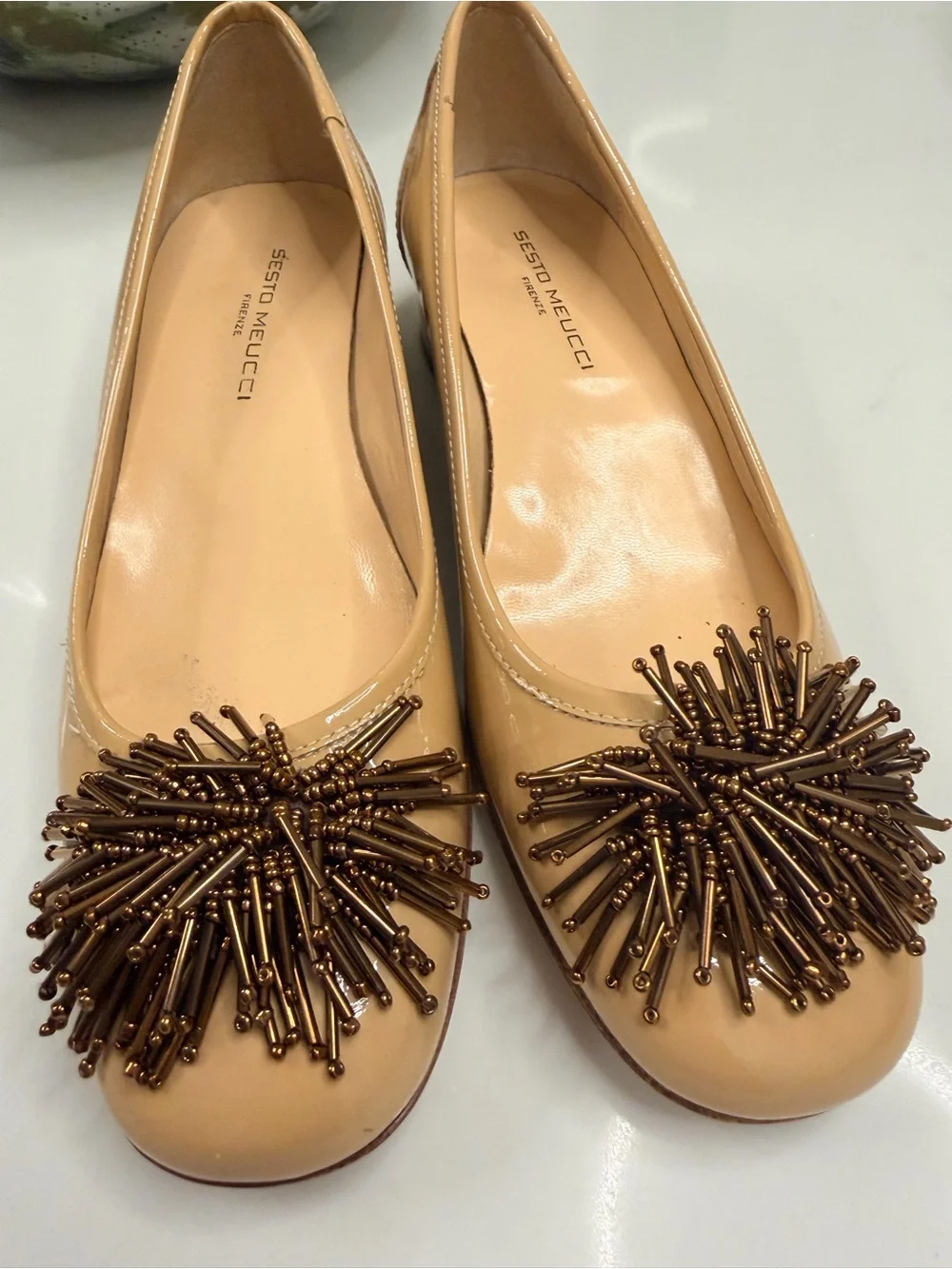 Sesto Meucci Nude Patent leather pumps  with Bronze Bead Pom-Poms